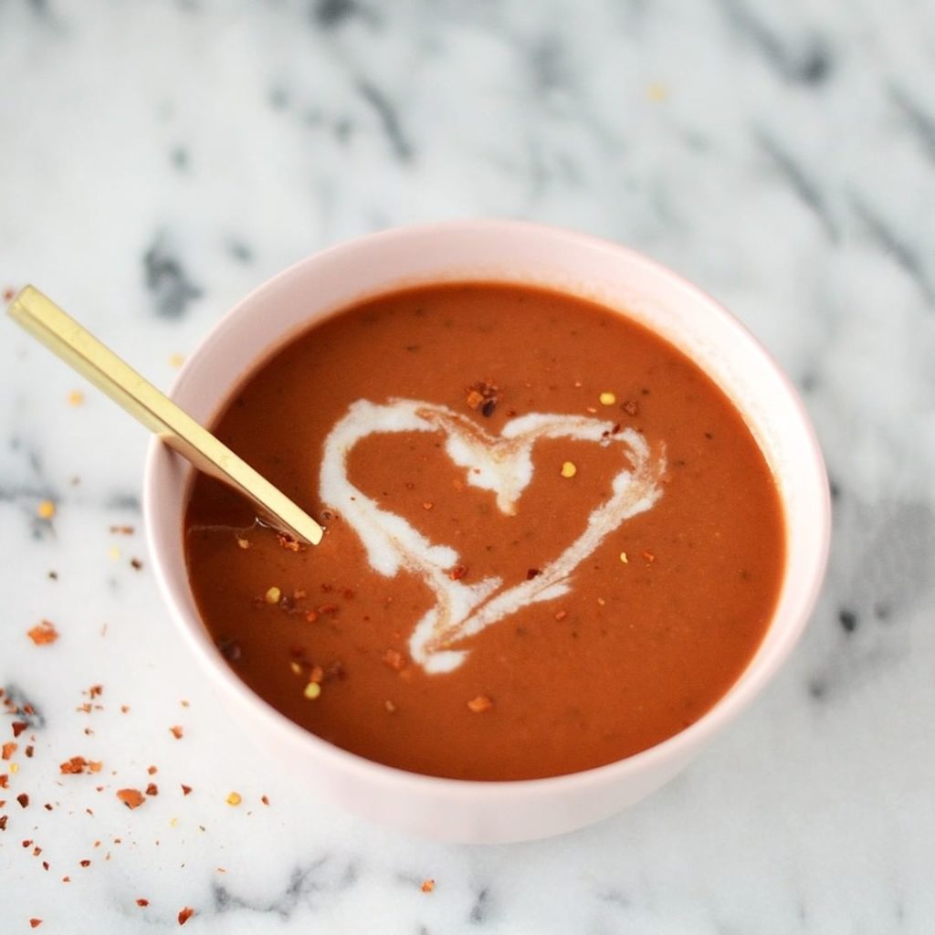 A bowl of vegan tomato soup with red pepper